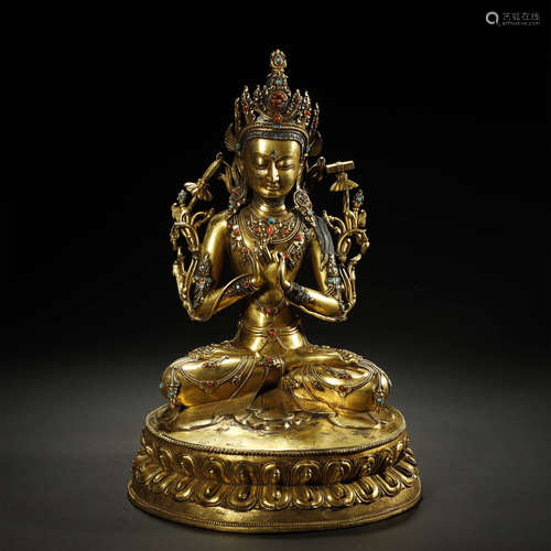 A CHINESE GILT-BRONZE CORAL-INLAID BUDDHA STATUE