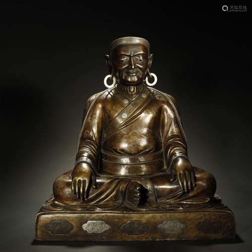 A TIBETAN SILVER-INLAID BRONZE BUDDHA STATUE