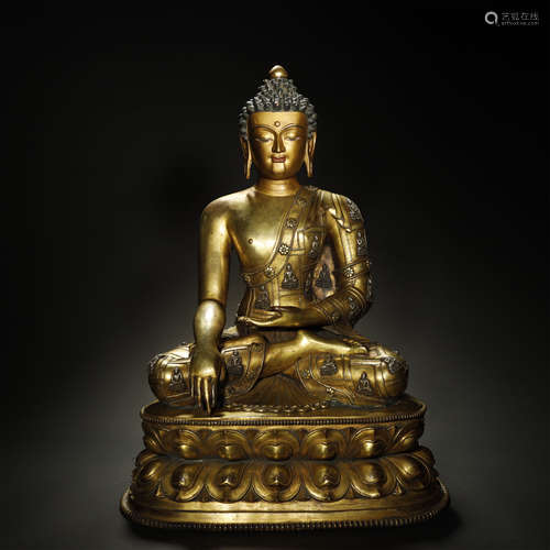 A TIBETAN GILT-BRONZE BUDDHA STATUE