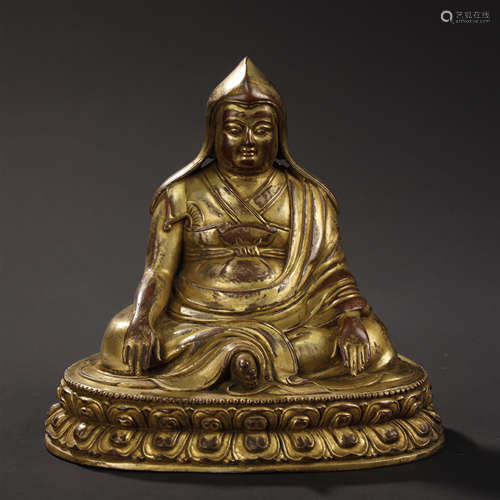 A TIBETAN GILT-BRONZE BUDDHA STATUE