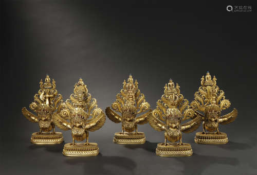 A SET OF CHINESE GILT-BRONZE RELIGIOUS WEAPONS