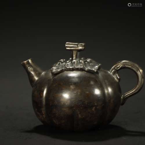 A CHINESE SILVER TEA POT