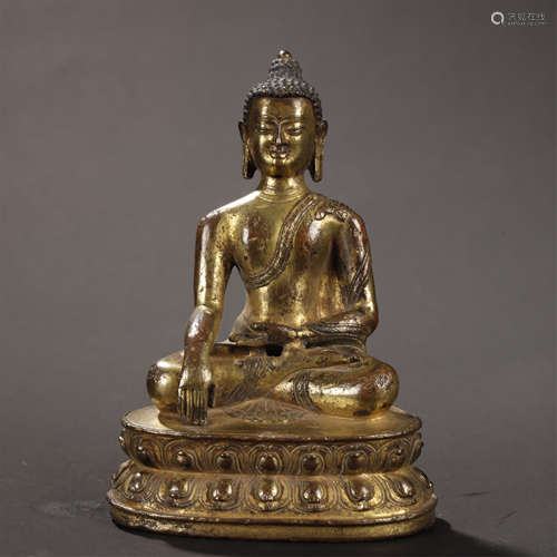 A CHINESE GILT-BRONZE BUDDHA STATUE