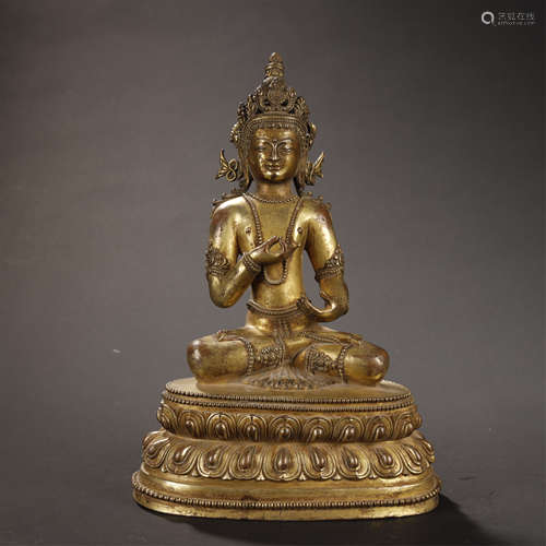 A CHINESE GILT-BRONZE BUDDHA STATUE