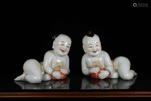 chinese porcelain figure of boy and girl