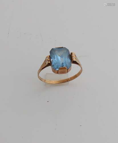 Gold ring with blue stone