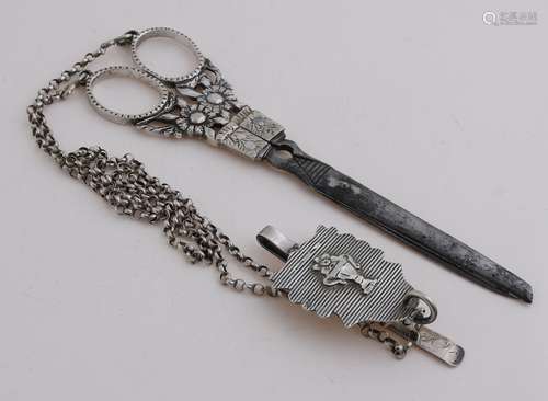 Scissors with silver, chain etc.