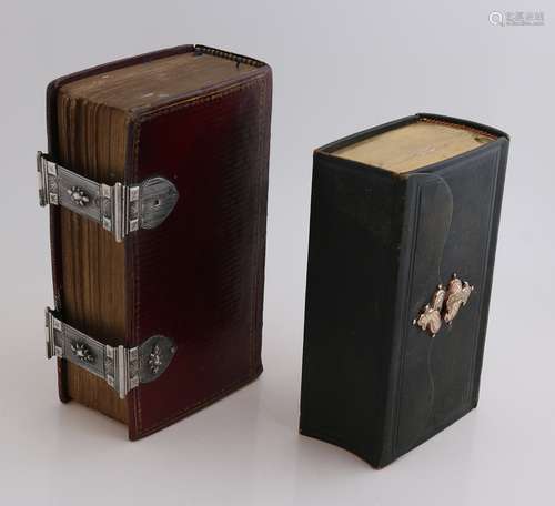 2 Bibles with gold and silverware