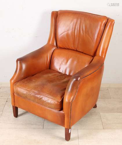 Old calf leather armchair