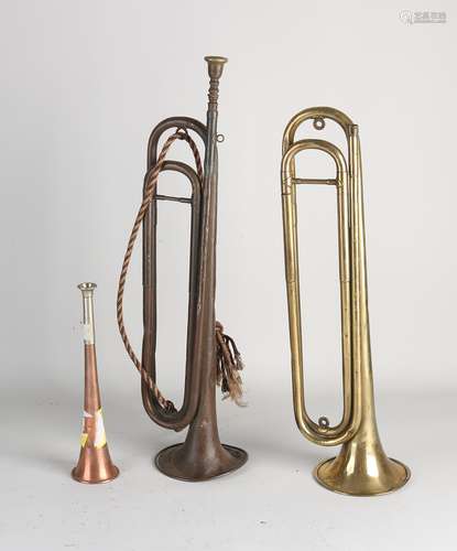 Three antique trumpets