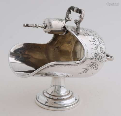 Silver sugar bowl with spoon