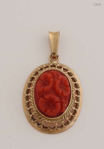 Gold pendant with carved coral