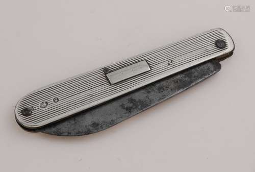 Antique folding knife with silver handle