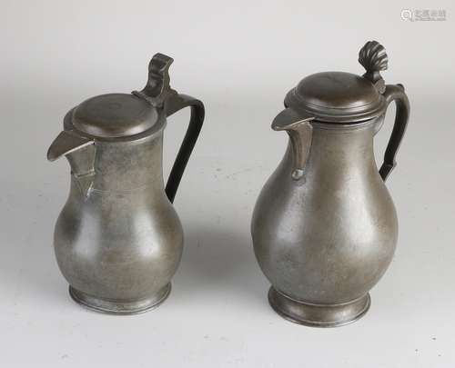 Two pewter pitchers