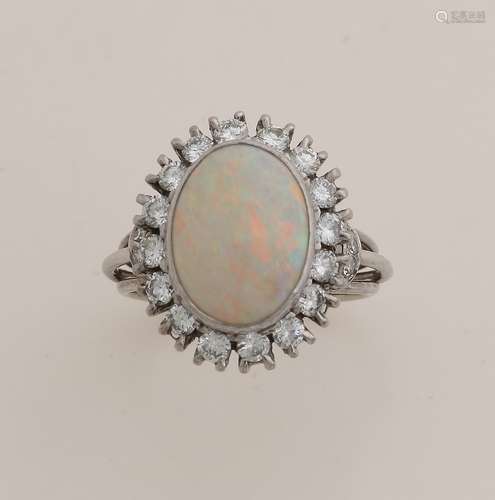 White gold ring with diamond and opal