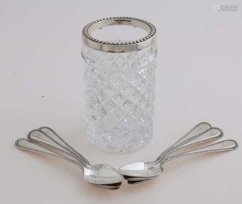 Spoon vase with silver spoons