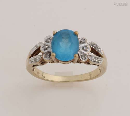 Ring with diamond and blue topaz.