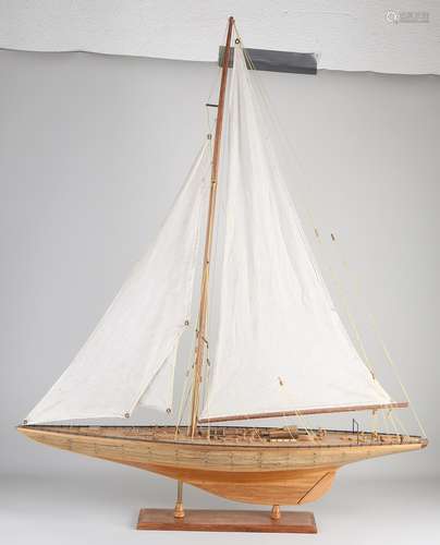 Wooden ship model on tripod