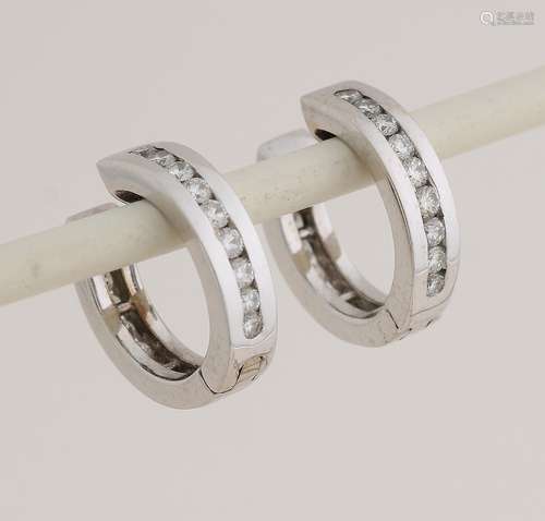 White gold creoles with diamonds.