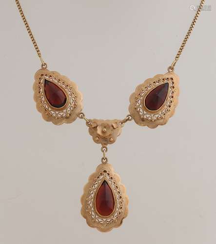 Gold choker with garnet