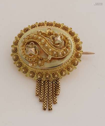 Gold regional brooch