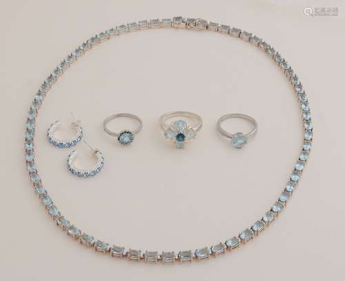 Set of silver jewelery with blue stone