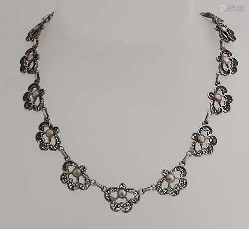 Necklace of filigree flowers