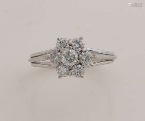 White gold entourage ring with diamond