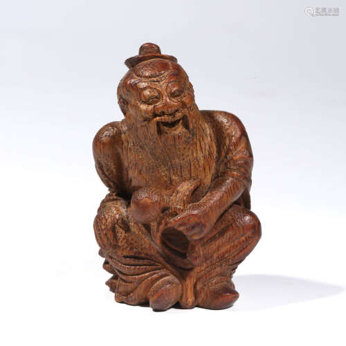 A CHINESE BAMBOO CARVING OF FIGURE