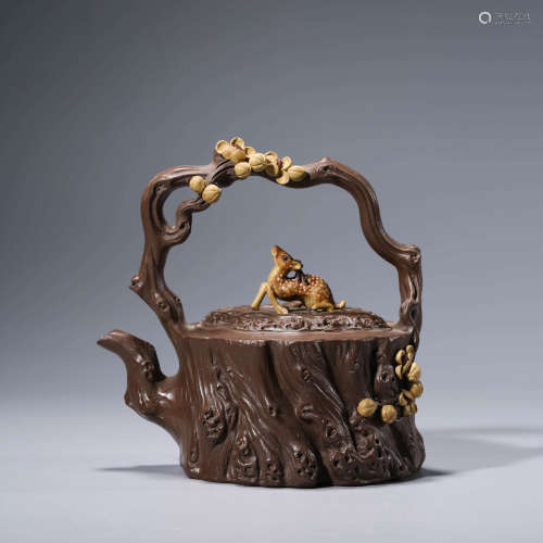A CHINESE PURPLE SAND DEER AND PEACH TEAPOT