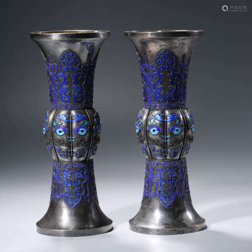 A PAIR OF CHINESE SILVER VASES WITH BLUING ENAMEL