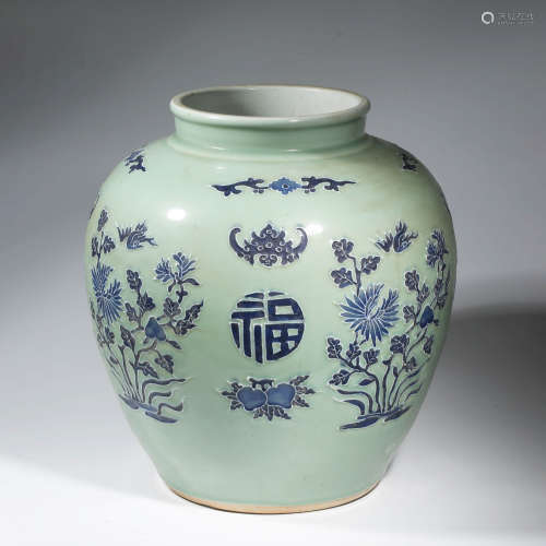 A CHINESE PORCELAIN CELADON-GALZED BATS AND PEACHES JAR