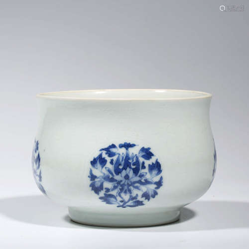 A CHINESE PORCELAIN BLUE AND WHITE INTERLOCKING BRANCHES BOW...