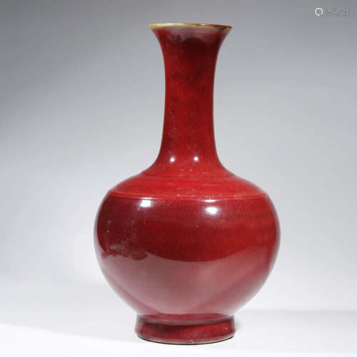 A CHINESE PORCELAIN COWPEA-RED-GLAZED VASE