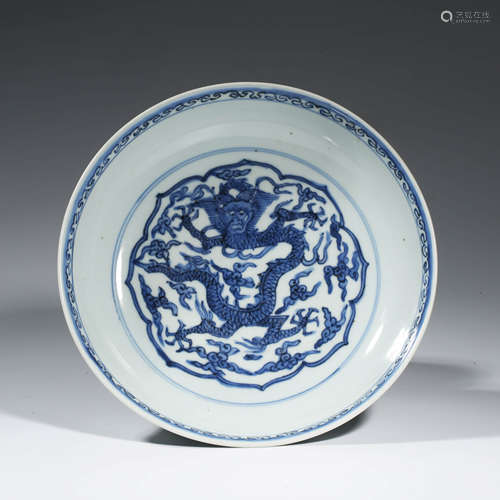 A CHINESE PORCELAIN BLUE AND WHITE DRAGON AND PHOENIX DISH