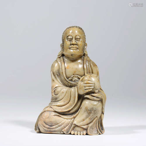 A CHINESE STONE CARVING OF A BUDDHA