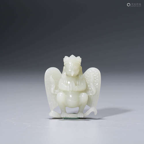 A CHINESE WHITE JADE IMMORTAL FIGURE