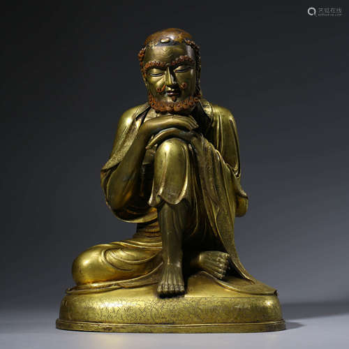 A CHINESE GILT-BRONZE BODHIDHARMA STATUE