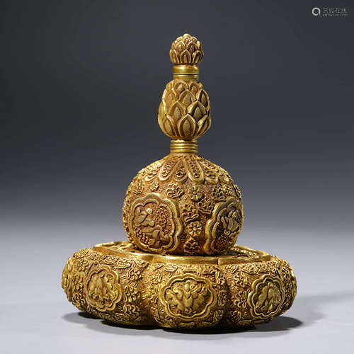 A SET OF CHINESE GILT-BRONZE DOUBLE-GOURD AND STAND