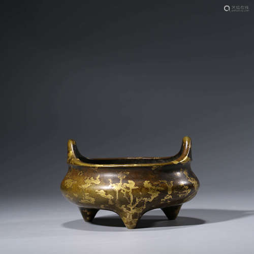 A CHINESE BRONZE GOLD SPLASHED TRIPOD CENSER