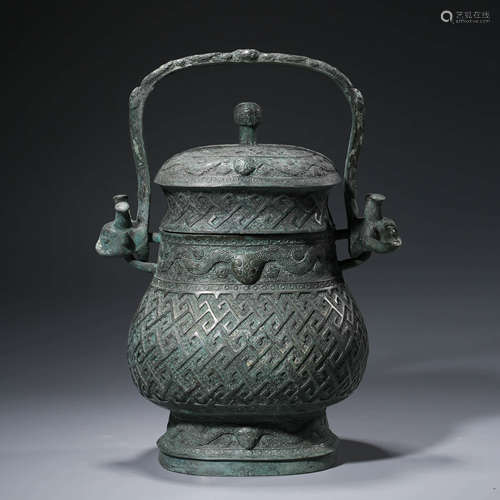 A CHINESE ARCHIASTIC BRONZE TAOTIE MASK WINE VESSEL, YOU