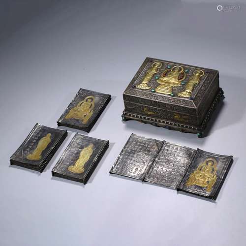 A SET OF CHINESE SILVER MANTRA BOOKS AND BOX