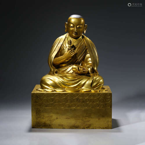 A CHINESE GITL-BRONZE GURU STATUE