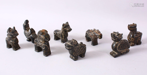 A MIXED LOT OF CHINESE CARVED DARK HARDSTONE FIGURES,