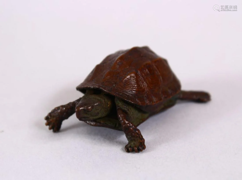 A JAPANESE BRONZE FIGURE OF A TORTOISE, signed to