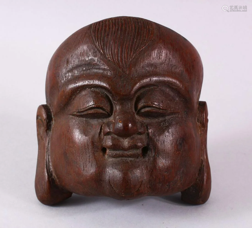 A 19TH / 20TH CENTURY CHINESE CARVED BAMBOO MASK OF