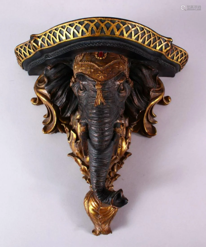 AN INDIAN ELEPHANT FORMED WALL BRACKET, 32cm x 33cm.