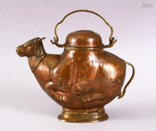 A 19TH CENTURY INDIAN COPPER EWER in the form of a cow,