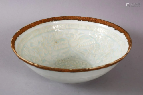 A CHINESE CELADON EGG SHELL PORCELAIN BOW, carved with