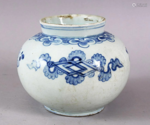 AN EARLY BLUE AND WHITE POTTERY VASE, possibly Persian